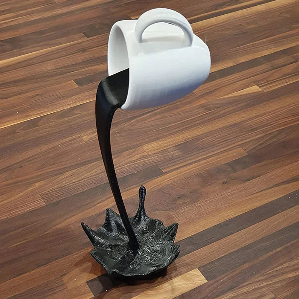 Floating Spilling Coffee Cup Sculpture